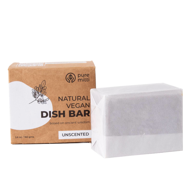 Handcrafted chemical-free natural dish soap bar unscented and vegan, wrapped in white paper beside recyclable brown cardboard box, suitable for household cleaning and Home & Decor collections.
