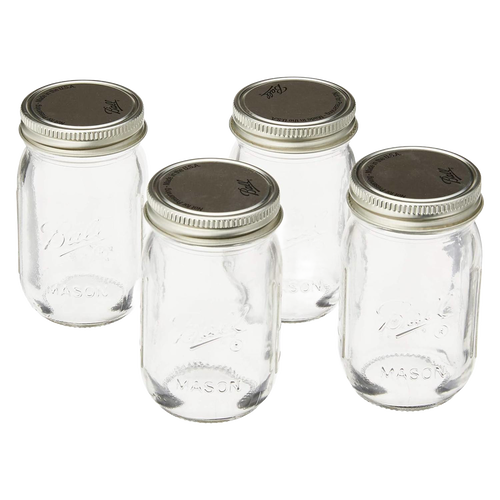 Set of four clear mini glass jars with silver metal lids, handcrafted in the USA, perfect for storage and organization in Home & Decor and Kitchen & Food collections.