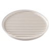 Oval off-white microwaveable grill tray with ribbed surface for draining fat and a flat side for versatile heating, handcrafted and made in USA, featured in Kitchen Gadgets and Best Sellers.