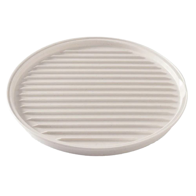 Oval off-white microwaveable grill tray with ribbed surface for draining fat and a flat side for versatile heating, handcrafted and made in USA, featured in Kitchen Gadgets and Best Sellers.