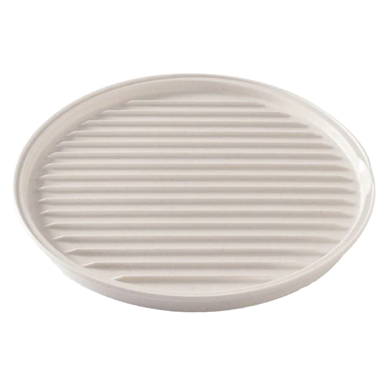 Oval off-white microwaveable grill tray with ribbed surface for draining fat and a flat side for versatile heating, handcrafted and made in USA, featured in Kitchen Gadgets and Best Sellers.