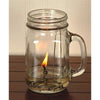 Glass pint jar lamp with lit cotton wick element burning a small flame, showcasing handcrafted parts for olive oil lamps in USA made lamps and lighting collections.