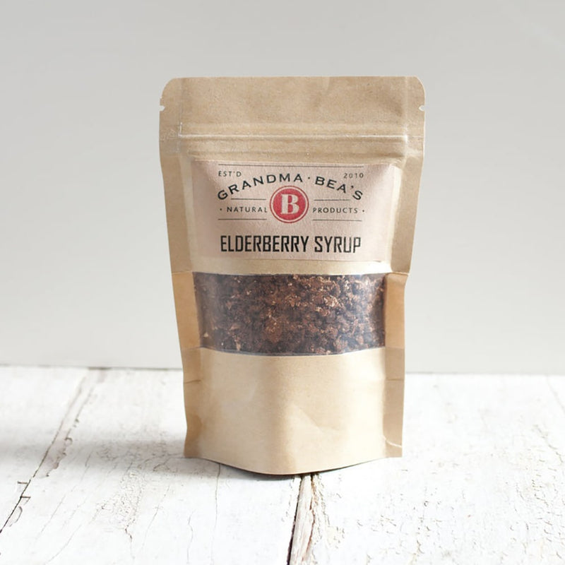 Brown kraft resealable pouch of natural elderberry syrup mix made in USA, part of Health & Wellness and Kitchen & Food collections, packaged for easy syrup preparation.