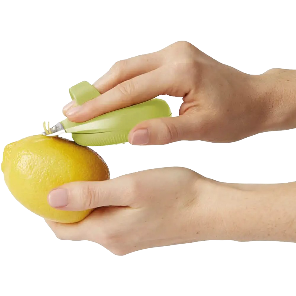 Handheld green PalmZester designed for comfortable zesting and peeling lemons, featuring an ergonomic grip and channel knife, ideal for Kitchen & Food and Cooking Helpers collections.