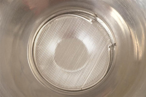 Top-down view inside large stainless steel milk strainer showing fine mesh screen and locking handle, handcrafted for Farm, Garden & Tool, Animal Care, Best Sellers, and Promo Eligible collections.