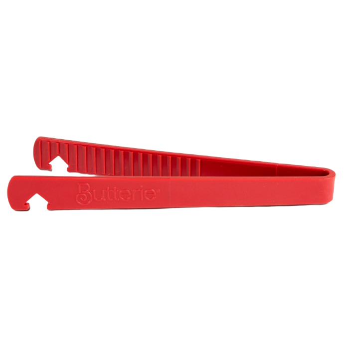 Red silicone toaster tongs with serrated gripping teeth and integrated oven rack hook, designed for safe heat handling in Kitchen & Food, Kitchen Gadgets, and Cooking and Baking Helpers collections.