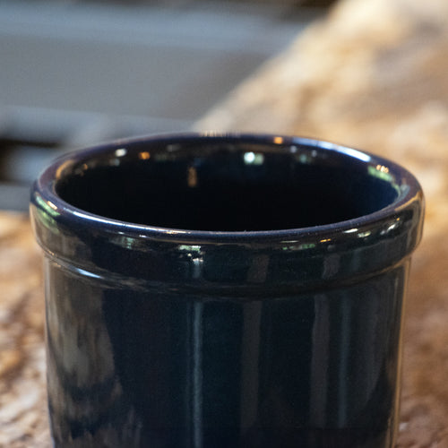 Handcrafted blue stoneware crock with a food-safe, lead-free glaze, ideal for small-batch fermenting, pickling, and kitchen use, made in the USA and featured in Food Preservation collections.