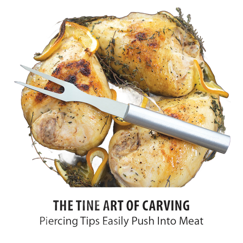 Stainless steel carving fork with long tines resting on golden roasted chicken pieces garnished with lemon wedges and fresh herbs, ideal for Kitchen & Food, Storage and Serving, USA Made, Best Sellers, and Promo Eligible collections.