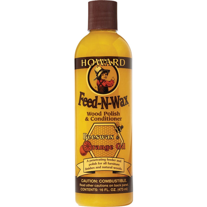 Plastic bottle of Feed-N-Wax wood polish and conditioner with beeswax and orange oil blend, designed to preserve and enhance wood surfaces, featured in Home & Decor and USA Made collections.