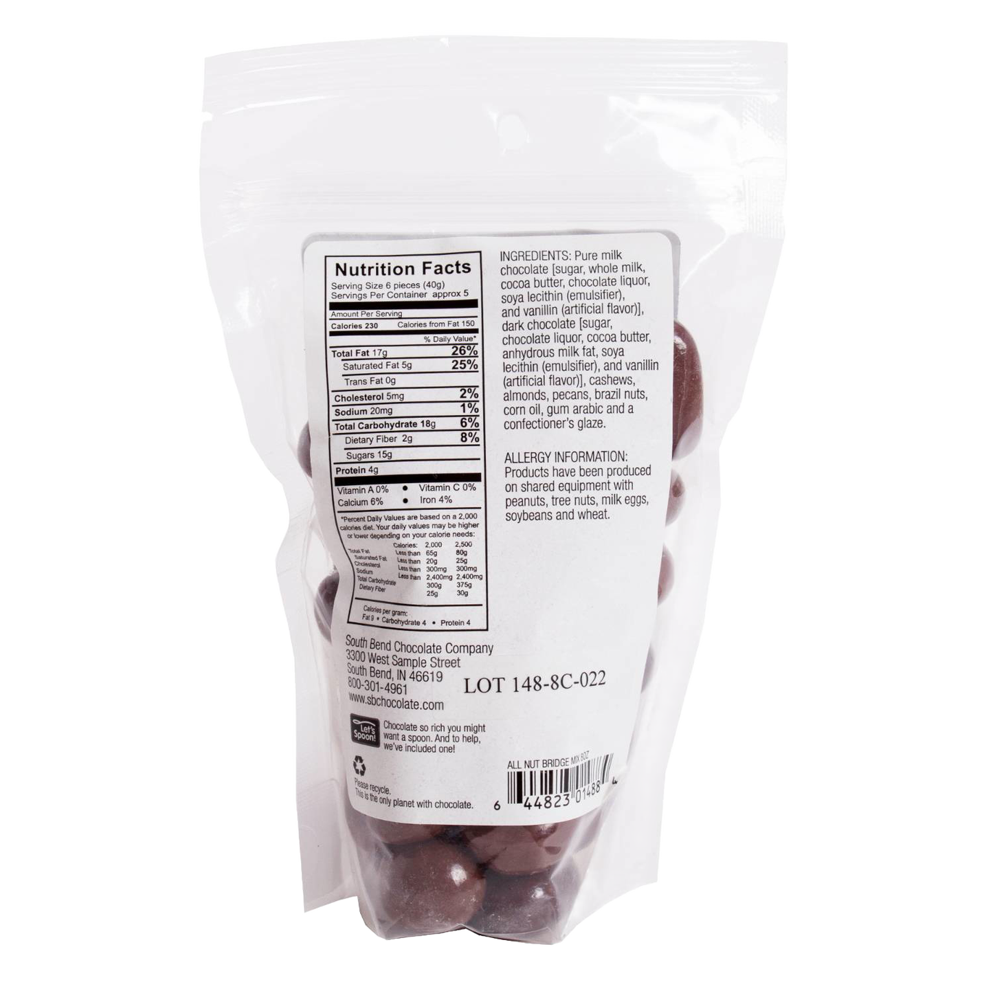 Resealable clear bag showing nutrition facts and ingredient details for milk chocolate coated nut mix, handcrafted and made in USA, ideal for Kitchen & Food, Snacks and Sweets, Candy, and Best Sellers collections.