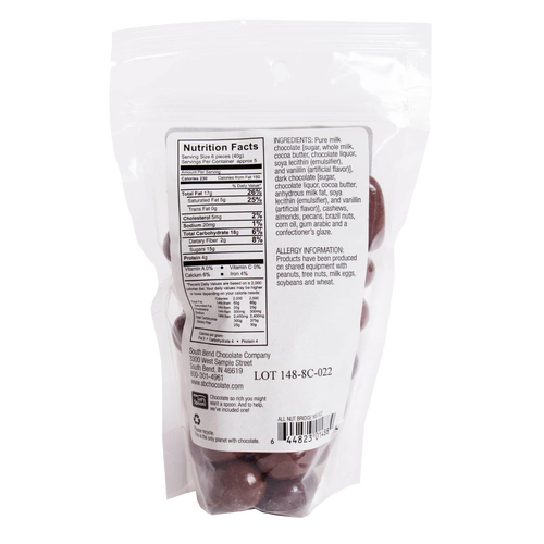 Resealable clear bag showing nutrition facts and ingredient details for milk chocolate coated nut mix, handcrafted and made in USA, ideal for Kitchen & Food, Snacks and Sweets, Candy, and Best Sellers collections.