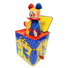 Handcrafted musical jack-in-the-box with a brightly colored jester that pops up when wound, featuring classic tin box design and cheerful clown illustrations, perfect for indoor play and children's toys collections.
