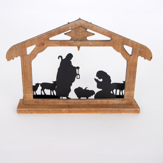 Wooden nativity display with metal silhouettes of the Holy Family and animals in a weathered stable, featuring a vintage style for Home & Decor and Holiday collections.