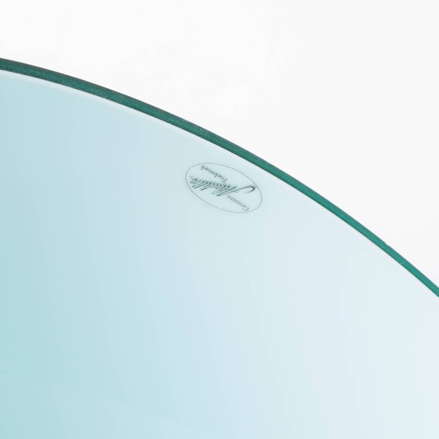 Close-up of a smooth, light blue glass lamp shade edge with an etched handcrafted signature, featured in Lamps & Lighting, Parts and Accessories, and Lamp Shades collections.