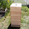Handcrafted Amish made 10-frame hive box with a notched inner cover featuring center ventilation hole, designed for moisture control and airflow in beekeeping, USA made.