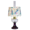 Handcrafted amethyst glass oil lamp featuring a clear glass font and a decorative peacock-patterned shade, part of Lamps & Lighting, Oil Lamps, and Table Lamps collections.
