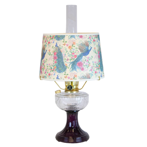 Handcrafted amethyst glass oil lamp featuring a clear glass font and a decorative peacock-patterned shade, part of Lamps & Lighting, Oil Lamps, and Table Lamps collections.