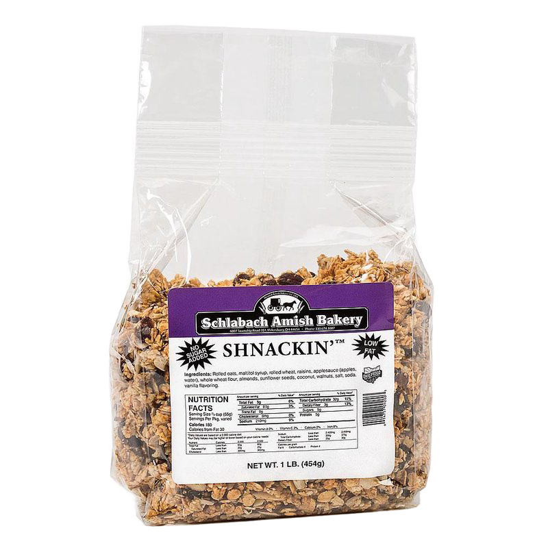 Clear resealable bag of handcrafted Shnackin granola with label showing nutrition facts and ingredients, featuring almonds, walnuts, sunflower seeds, coconut, and raisins, made in USA for Kitchen & Food, Snacks and Sweets, Dry Goods and Mixes, Best Sellers, and Promo Eligible collections.