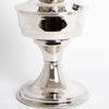 Close-up of a handcrafted chrome-plated oil lamp base with a polished, reflective surface, part of Lamps & Lighting, Oil Lamps, and Best Sellers collections.