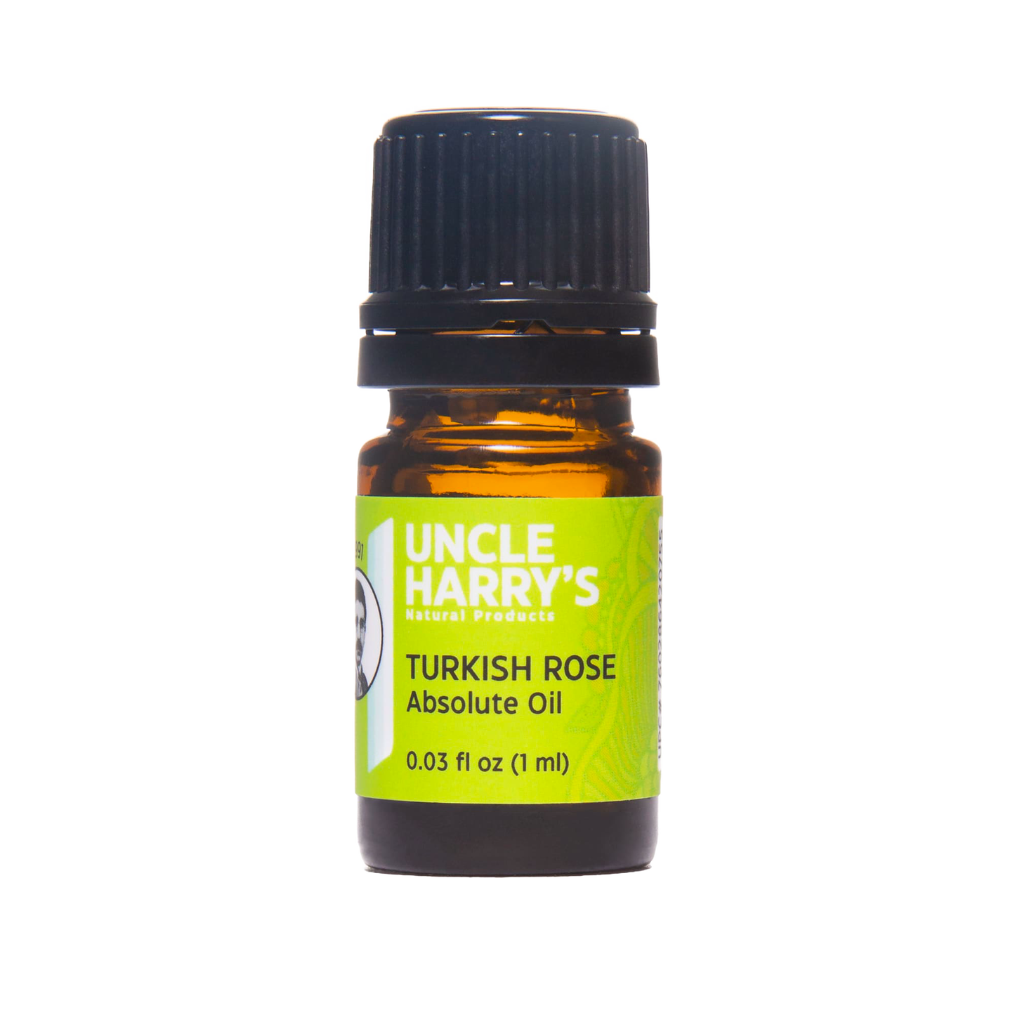 Small amber glass bottle with black screw cap containing handcrafted Turkish rose absolute oil, labeled in green and white, featured in Health & Wellness, USA Made, and Best Sellers collections.