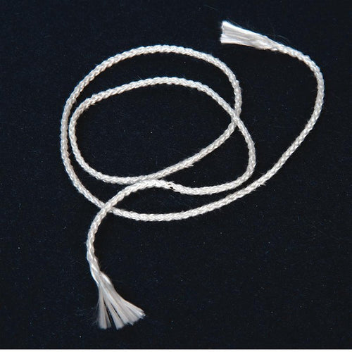 Close-up of a flexible round wick made from braided fiberglass fibers, ideal for lamps and candle crafting, featured in Candlemaking Supplies, Best Sellers, and Promo Eligible collections.