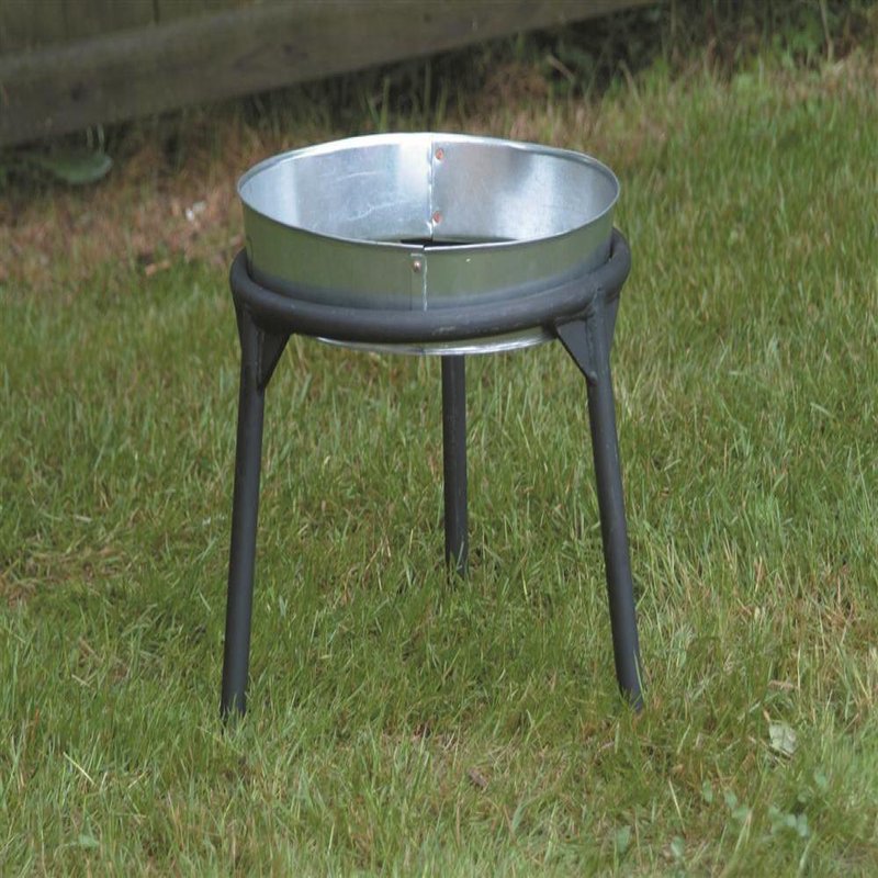 Sturdy three-legged stand crafted for holding kettles over open flames, featuring heavy steel construction and suitable for outdoor camping, cookware, and garden use with a clearance for pots.