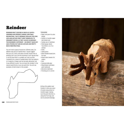 Close-up of a handcrafted wooden reindeer carving with detailed antlers displayed on a rustic surface, shown alongside pattern instructions and a toolbox list from a how-to whittling book in Toys, Books & Games and Home and Garden How-To Books collections.