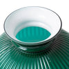 Close-up of a handcrafted green ribbed glass oil lamp shade with a smooth white enamel rim, adding a warm, diffused glow and rustic charm to Farm, Garden & Tool and Lamps & Lighting collections.