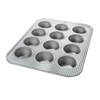 Durable 12-cup muffin pan with fluted surface and patented Americoat Plus nonstick coating, crafted for Kitchen & Food, Cookware, Baking Supplies, and USA Made collections.