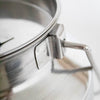 Close-up view of a seamless 304 grade stainless steel milk can handle with a polished finish, crafted for easy cleaning and durability in farm and animal care settings.