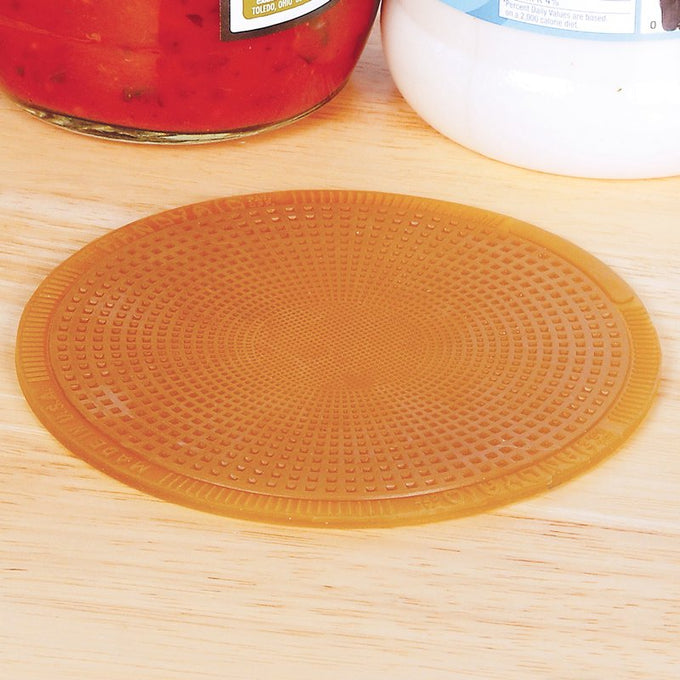 Round rubber jar opener with textured surface designed to grip lids securely, protecting hands while opening jars, crafted for Kitchen & Food, Kitchen Gadgets, and USA Made collections.