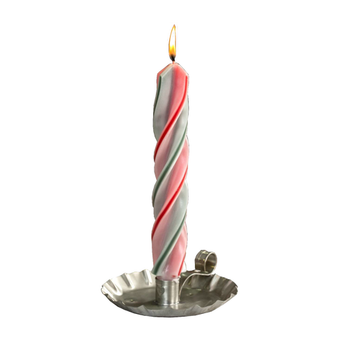 Handcrafted red and green spiral candle lit in a vintage-style metal holder, perfect for adding a festive touch to holiday decor and home lighting collections.