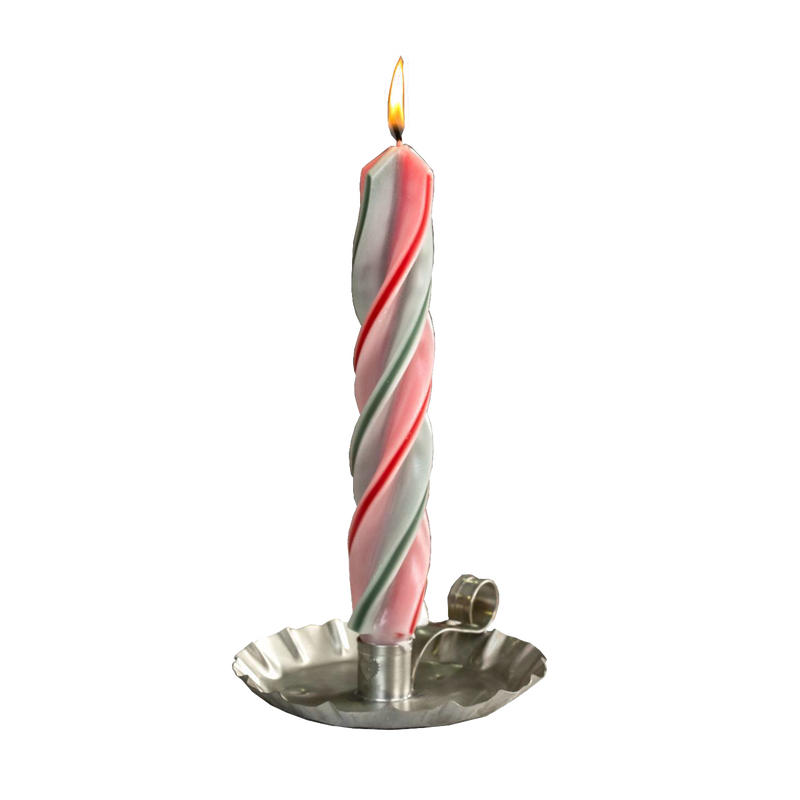 Handcrafted red and green spiral candle lit in a vintage-style metal holder, perfect for adding a festive touch to holiday decor and home lighting collections.