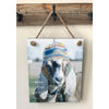 Handcrafted rope-hung wall plaque featuring a goat wearing a colorful knit hat with the uplifting Bible verse "a time to laugh," made in USA, perfect for Home & Decor and Best Sellers collections.
