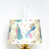 Shatterproof parchment lamp shade featuring a colorful peacock and floral design, crafted to enhance light diffusion for lamps in Lamps & Lighting and Lamp Shades collections.