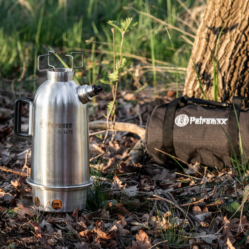Portable stainless steel fire kettle with attached stove base and foldable pot stand, designed for quick boiling using natural fuels; ideal for camping, farm, garden, and emergency supplies collections.
