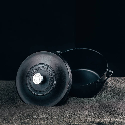 Heavy-duty cast iron Dutch oven with a matte black finish and sturdy handles, handcrafted and made in the USA for Kitchen & Food, Cookware, Cast Iron collections.