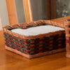 Handcrafted Amish-made napkin basket with woven natural fibers in earthy tones, perfect for home decor and kitchen use, featured in USA Made, Best Sellers, and Dinnerware collections.