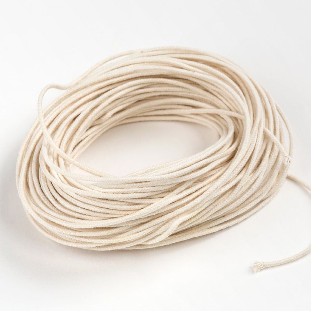 Coiled medium paper core wick for container candles, crafted for optimal burning performance, ideal for use in lamps, candlemaking supplies, and best seller collections.