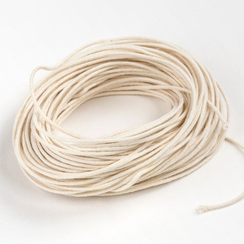 Coiled medium paper core wick for container candles, crafted for optimal burning performance, ideal for use in lamps, candlemaking supplies, and best seller collections.