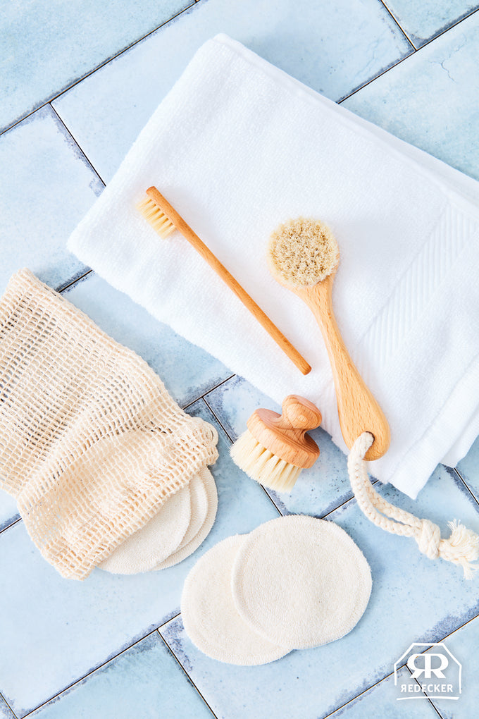 Set of handcrafted grooming tools including a gentle face brush with oiled beechwood handle, soft bristles, reusable cotton pads, and a mesh bag, promoting Health & Wellness, Grooming and Personal Hygiene, Best Sellers, and Promo Eligible collections.