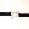 Close-up of a silver metal clasp connecting two ends of a black elastic strap, designed to secure covers, featured in Home & Decor and Best Sellers collections.