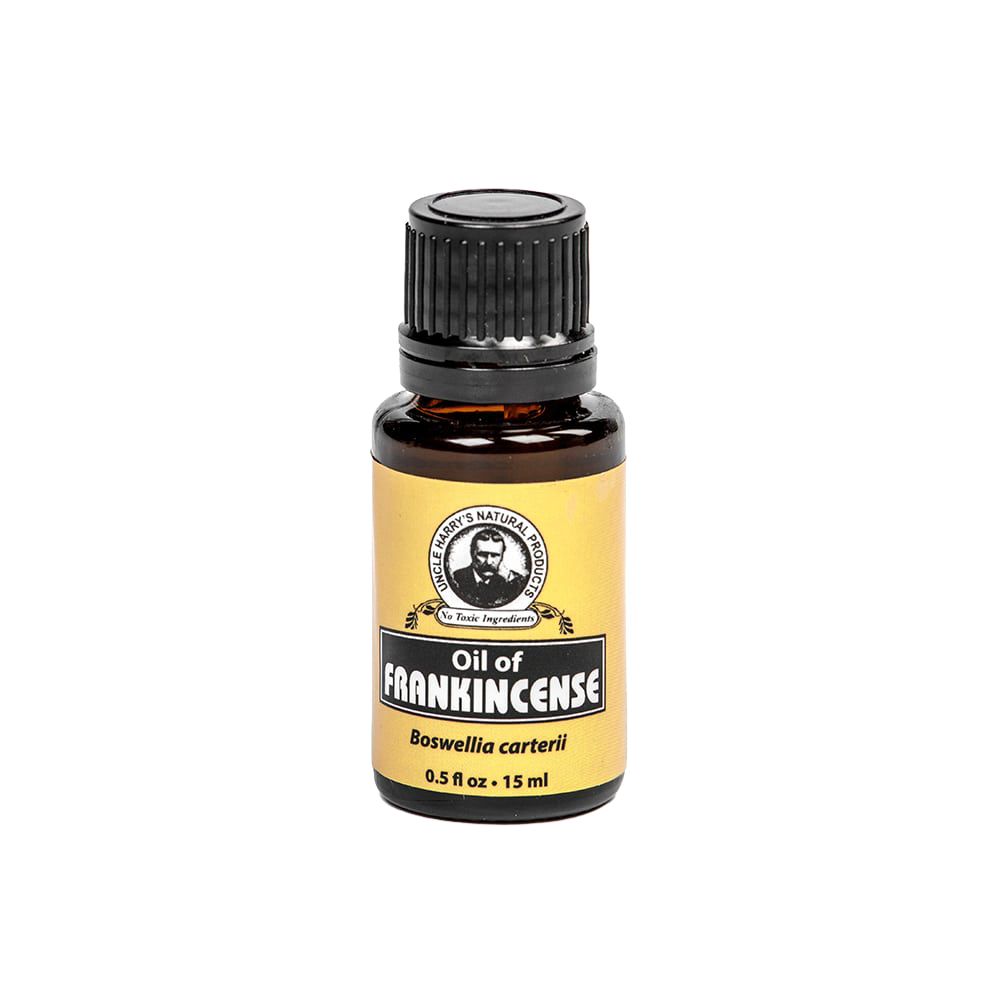 Amber glass bottle of pure frankincense essential oil with a black cap and yellow label, made in USA, ideal for health remedies, wellness, and aromatherapy use.