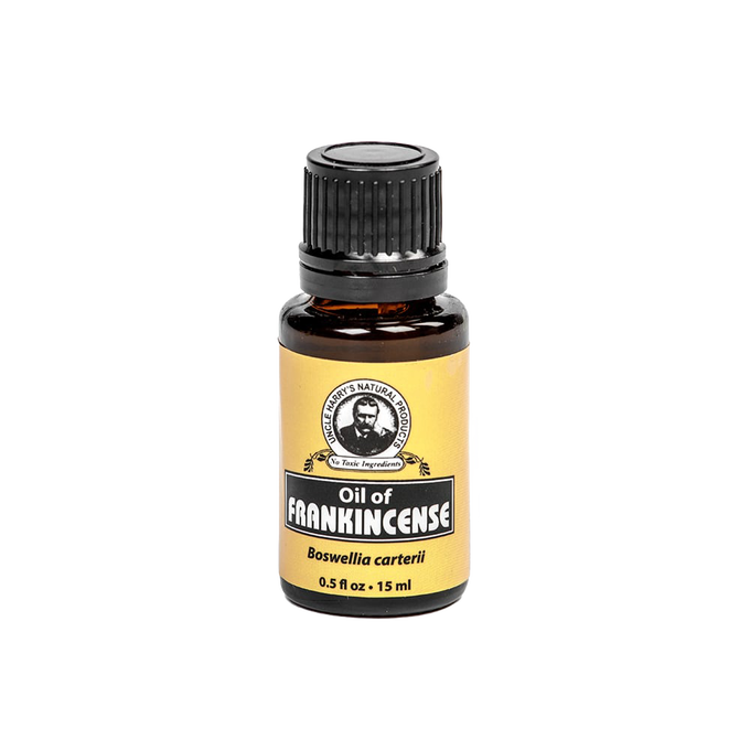 Amber glass bottle of pure frankincense essential oil with a black cap and yellow label, made in USA, ideal for health remedies, wellness, and aromatherapy use.