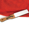 Hard whetstone sharpening stone with a smooth white surface mounted on a hardwood paddle handle, handcrafted in the USA, ideal for grooming and personal hygiene care.