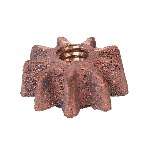 Close-up of a handcrafted bronze gear pinion with eight teeth and central threaded hole, designed for use in apple peeling equipment, featured in farm and kitchen tool collections.