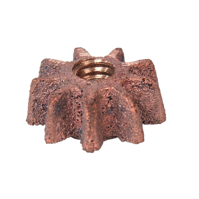 Close-up of a handcrafted bronze gear pinion with eight teeth and central threaded hole, designed for use in apple peeling equipment, featured in farm and kitchen tool collections.