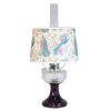 Handcrafted oil lamp featuring a clear glass font over an amethyst pedestal base with a decorative peacock-patterned shade, part of Lamps & Lighting, Oil Lamps, and Best Sellers collections.