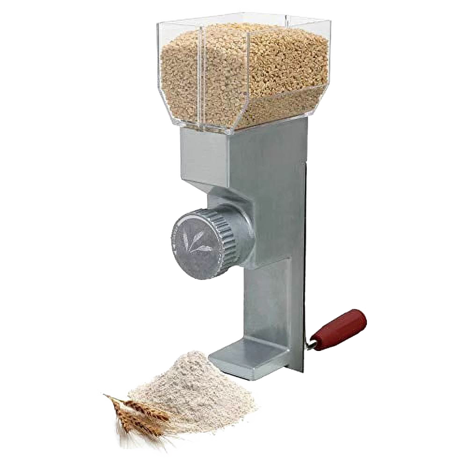 Compact grain mill with adjustable front dial and stainless steel burrs, featuring a wooden handle and clear hopper filled with grain, shown with fresh flour and wheat stalks, ideal for Kitchen & Food and Bread Making Supplies collections.