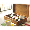 Handcrafted acacia wood tea box with ten compartments holding assorted tea packets, shown open next to a steaming cup of tea with a lemon wedge in Kitchen & Food and Storage collections.
